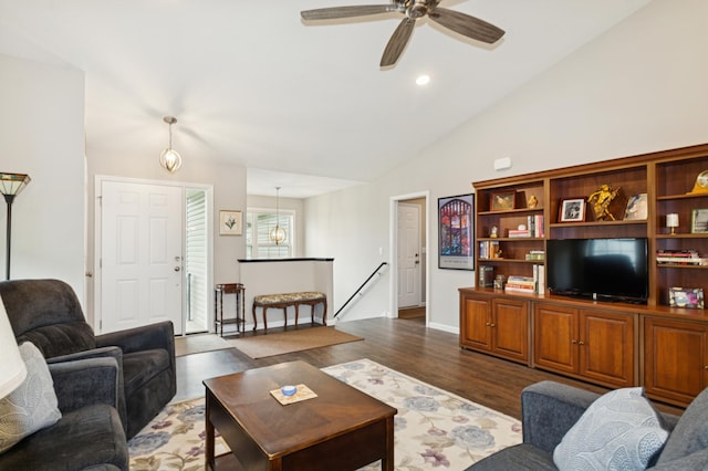 9769 Jeremiah Ct NE, Hanover, MN 55341 - living room featuring dark wood-style flooring, a ceiling fan, lofted ceiling, and baseboards