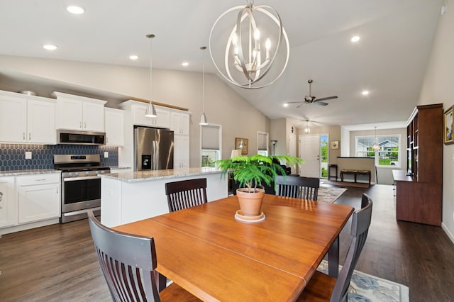 9769 Jeremiah Ct NE, Hanover, MN 55341 - dining space featuring a ceiling fan, a chandelier, dark wood-style flooring, high vaulted ceiling, and recessed lighting
