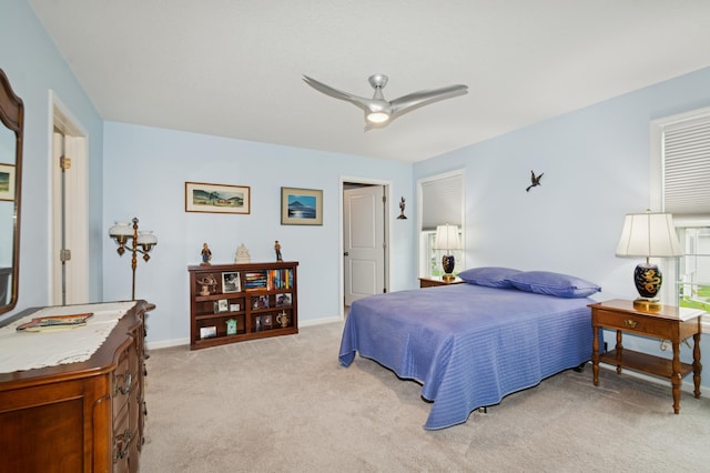 9769 Jeremiah Ct NE, Hanover, MN 55341 - bedroom with light carpet, baseboards, and ceiling fan