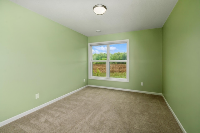 9769 Jeremiah Ct NE, Hanover, MN 55341 - unfurnished room featuring carpet floors and baseboards