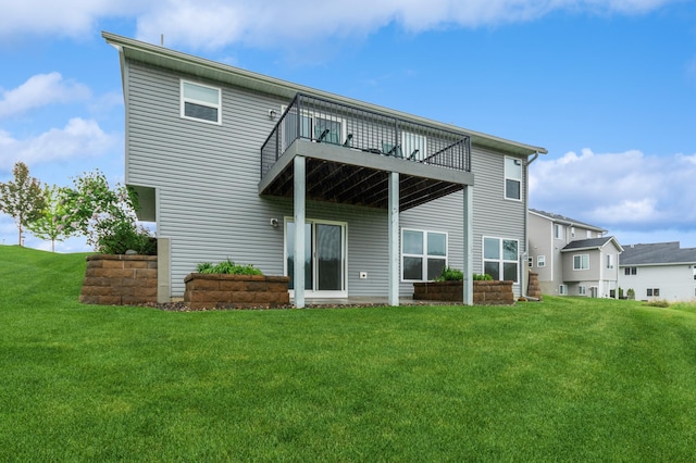 9769 Jeremiah Ct NE, Hanover, MN 55341 - rear view of property featuring a lawn and a balcony