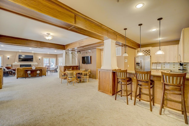 350 Main St N Unit 230, Stillwater, MN 55082 - dining space featuring light carpet, recessed lighting, ornate columns, and a fireplace
