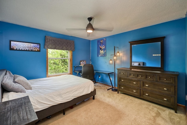 17299 66th Pl N, Maple Grove, MN 55311 - bedroom featuring light carpet, ceiling fan, and a textured ceiling