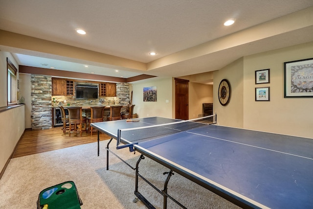 17299 66th Pl N, Maple Grove, MN 55311 - recreation room featuring bar area, recessed lighting, wood finished floors, and carpet