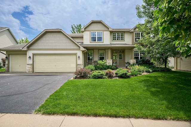 17299 66th Pl N, Maple Grove, MN 55311 - craftsman inspired home with an attached garage, stone siding, covered porch, and a front lawn
