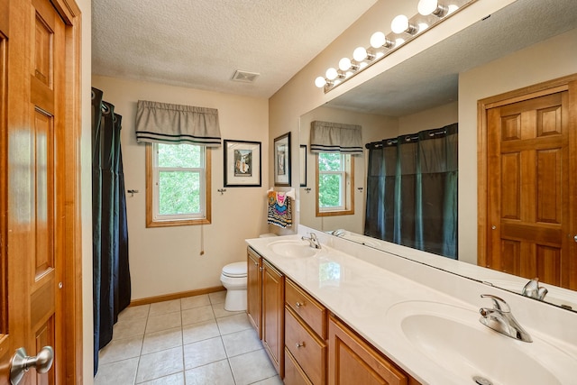 17299 66th Pl N, Maple Grove, MN 55311 - full bath with double vanity, tile patterned flooring, a textured ceiling, and curtained shower