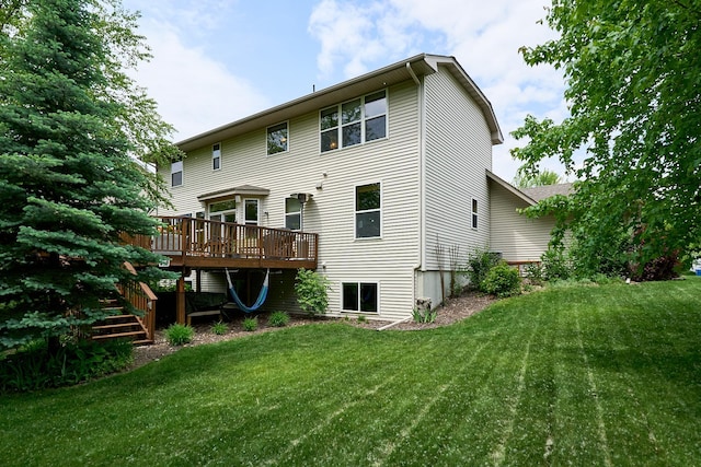 17299 66th Pl N, Maple Grove, MN 55311 - back of property featuring a yard and a wooden deck