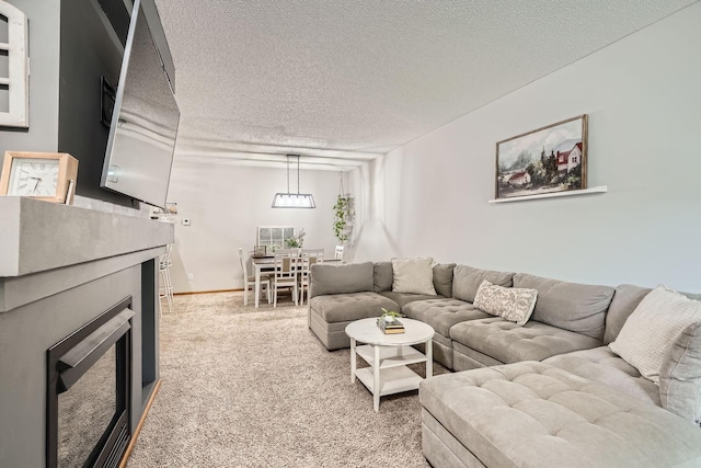13397 Europa Ct N Unit 5, Hugo, MN 55038 - living area with a fireplace, a textured ceiling, and light colored carpet
