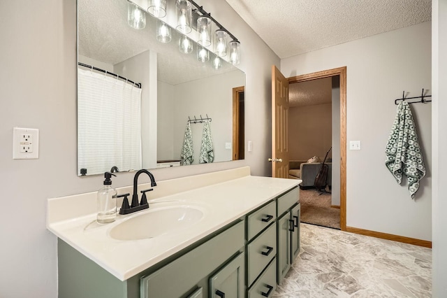 13397 Europa Ct N Unit 5, Hugo, MN 55038 - bathroom with a textured ceiling, vanity, and baseboards