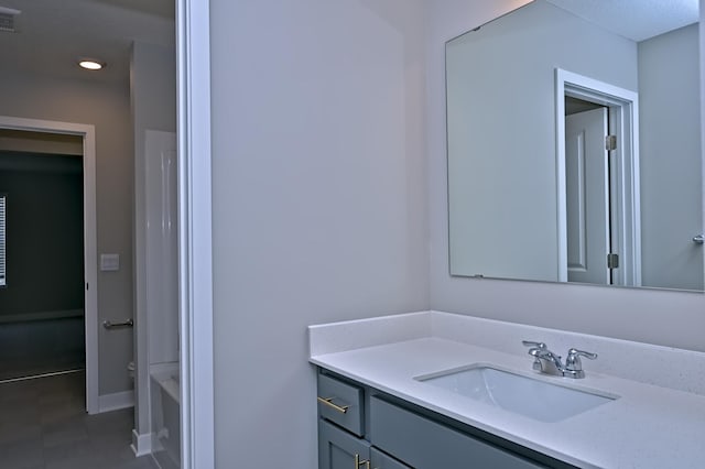 full bath with a bathing tub, vanity, visible vents, walk in shower, and tile patterned floors