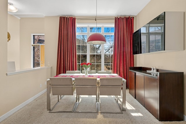 831 River Mews Ct, Minneapolis, MN 55414 - carpeted dining room featuring healthy amount of natural light