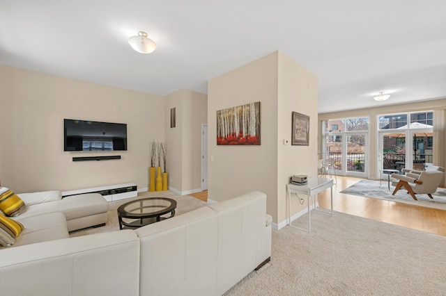 831 River Mews Ct, Minneapolis, MN 55414 - living area featuring light colored carpet and baseboards
