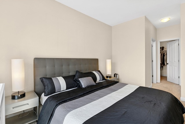 831 River Mews Ct, Minneapolis, MN 55414 - bedroom with carpet floors and a spacious closet