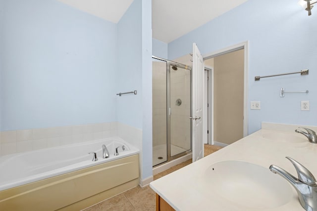 831 River Mews Ct, Minneapolis, MN 55414 - full bathroom featuring a bath, a stall shower, double vanity, and tile patterned flooring