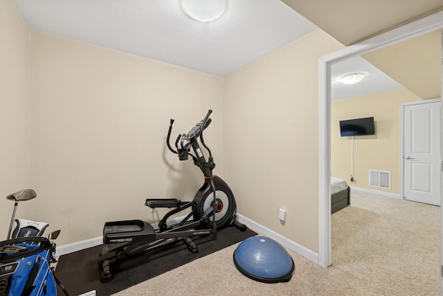 831 River Mews Ct, Minneapolis, MN 55414 - exercise room with baseboards and carpet