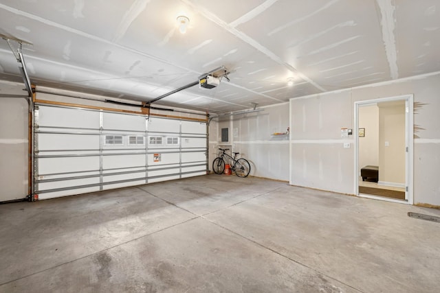 831 River Mews Ct, Minneapolis, MN 55414 - garage featuring a garage door opener