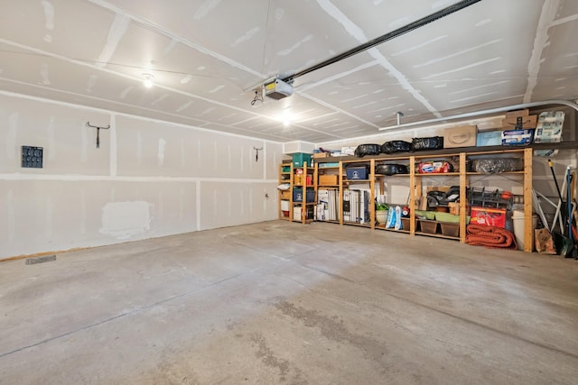 831 River Mews Ct, Minneapolis, MN 55414 - garage featuring a garage door opener