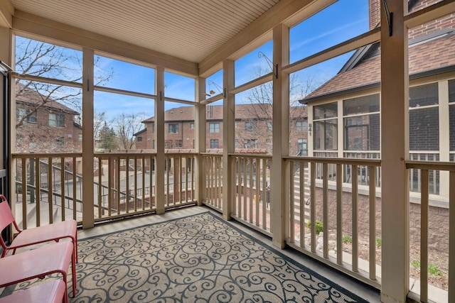 831 River Mews Ct, Minneapolis, MN 55414 - unfurnished sunroom with a residential view