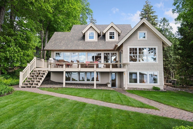 19820 Lakeview Ave, Deephaven, MN 55331 - back of house with a wooden deck, a yard, stairway, and a shingled roof