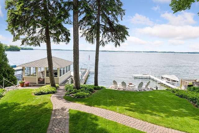 19820 Lakeview Ave, Deephaven, MN 55331 - dock featuring a water view, a yard, and boat lift