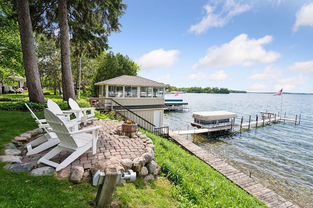 19820 Lakeview Ave, Deephaven, MN 55331 - dock area with a water view, an outdoor fire pit, and boat lift