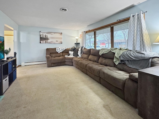 living room featuring visible vents, light carpet, and baseboard heating