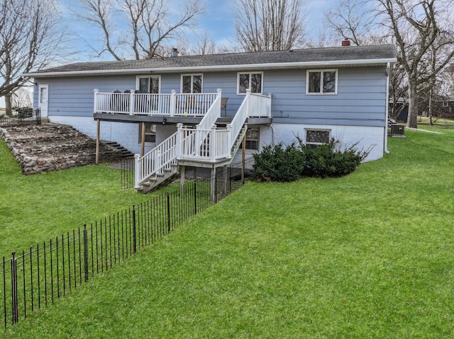 back of property featuring a deck, a fenced backyard, central AC unit, a yard, and stairway