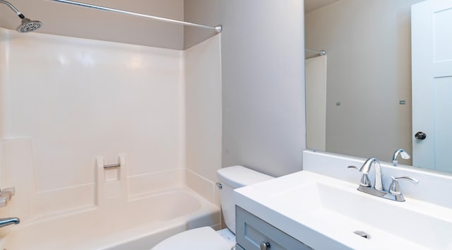 2930 Blaisdell Ave Unit 124, Minneapolis, MN 55408 - bathroom featuring toilet, vanity, and bathing tub / shower combination