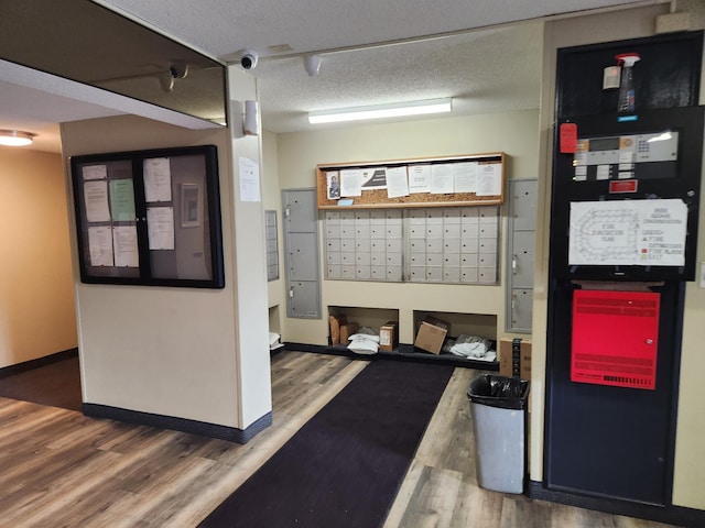 2930 Blaisdell Ave Unit 124, Minneapolis, MN 55408 - view of community featuring mail area and a textured ceiling