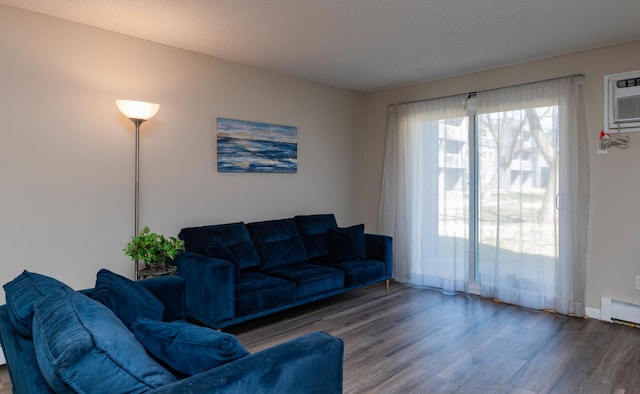 2930 Blaisdell Ave Unit 124, Minneapolis, MN 55408 - living room with wood finished floors and a baseboard radiator