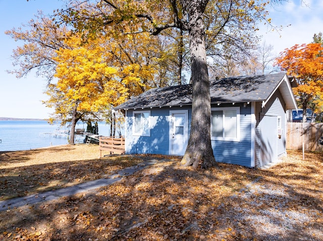 12742 Lake Miltona Dr NE, Miltona, MN 56354 - view of side of property featuring a water view and an outbuilding