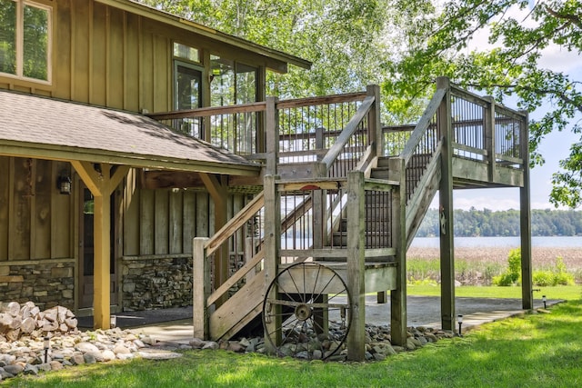 12037 Northgate Ln, Crosslake, MN 56442 - view of play area with a deck, stairs, and a lawn
