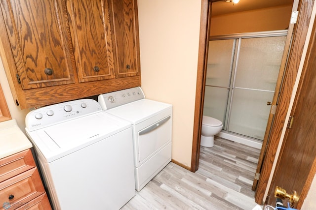 1219 7th St S Unit 1, Moorhead, MN 56560 - laundry area with washing machine and dryer and light wood finished floors