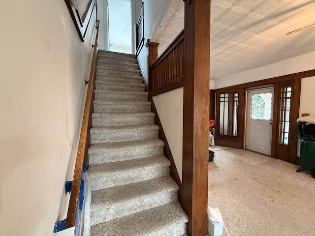 616 5th St, Madison, MN 56256 - staircase with carpet flooring