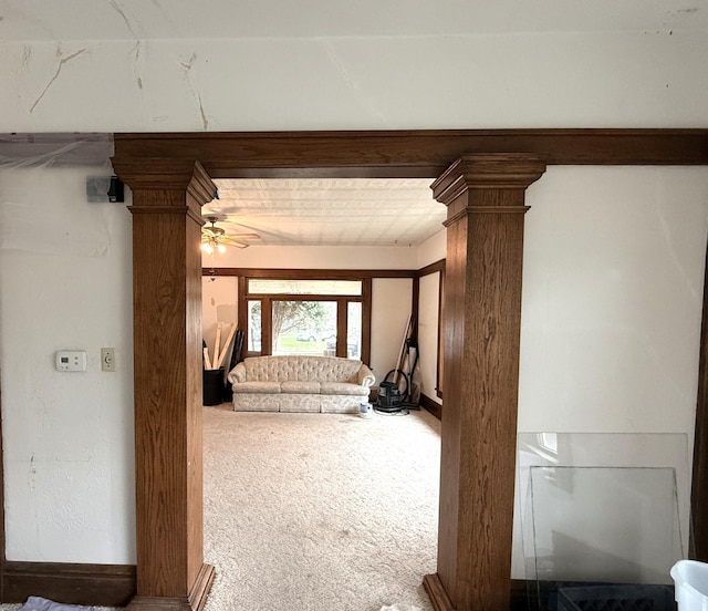 616 5th St, Madison, MN 56256 - corridor with carpet and decorative columns