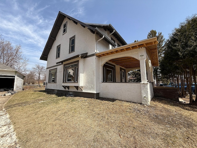 616 5th St, Madison, MN 56256 - view of property exterior with stucco siding