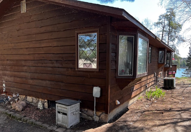 22612 Greenwood Loop, Park Rapids, MN 56470 - view of side of home featuring central AC