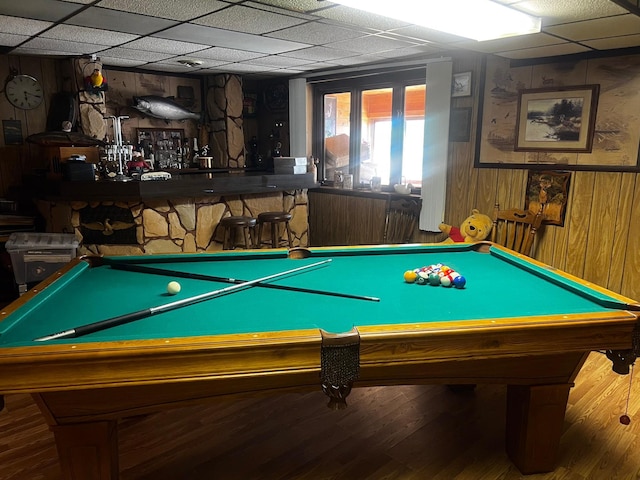 22612 Greenwood Loop, Park Rapids, MN 56470 - game room with pool table, a bar, a paneled ceiling, and wooden walls