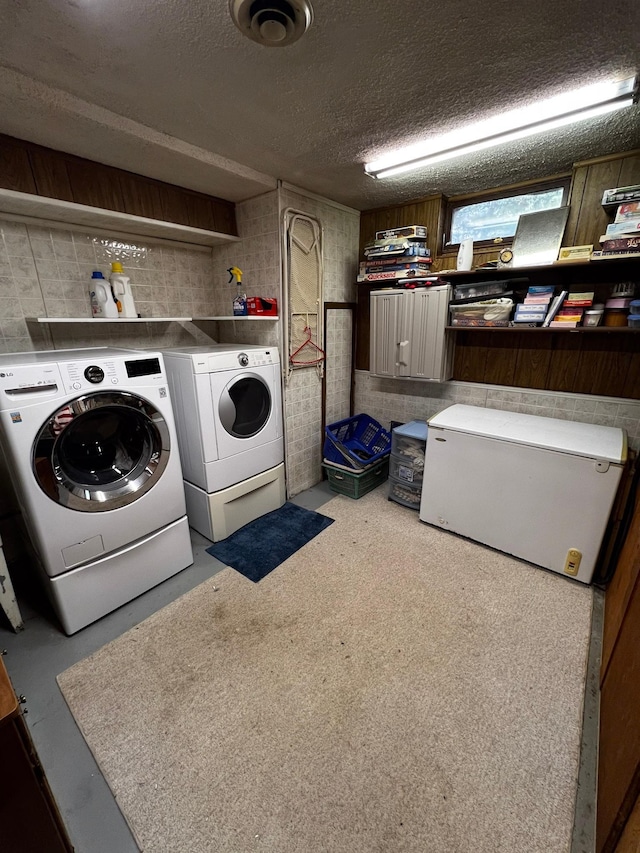 22612 Greenwood Loop, Park Rapids, MN 56470 - laundry area featuring separate washer and dryer and a textured ceiling