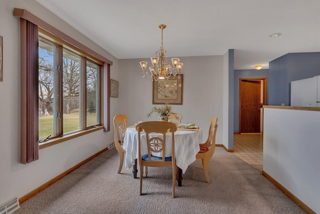 4762 383rd St, Sartell, MN 56377 - carpeted dining space with a chandelier and baseboards