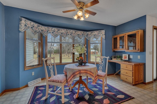 4762 383rd St, Sartell, MN 56377 - dining space featuring light flooring, baseboards, and ceiling fan