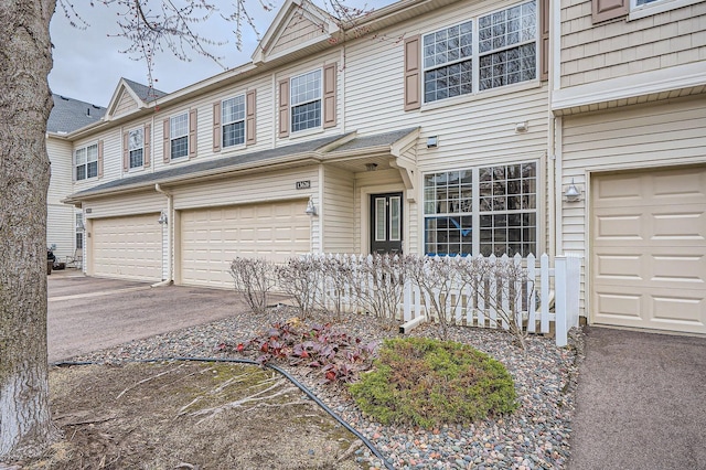 13626 Brass Pkwy Unit 27, Rosemount, MN 55068 - view of front of house featuring an attached garage and aphalt driveway