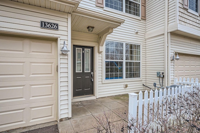 13626 Brass Pkwy Unit 27, Rosemount, MN 55068 - entrance to property featuring a garage and fence