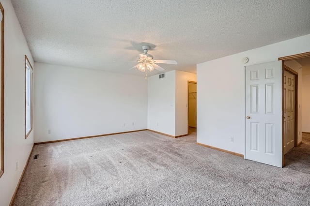 13626 Brass Pkwy Unit 27, Rosemount, MN 55068 - interior space featuring visible vents, baseboards, a ceiling fan, and a textured ceiling