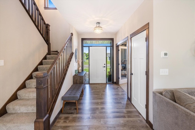 1030 Bellaire Blvd NW, Isanti, MN 55040 - foyer with wood finished floors and stairs