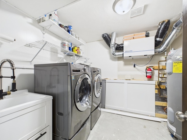 1214 Olivia St SE, New Prague, MN 56071 - laundry room with independent washer and dryer and cabinet space