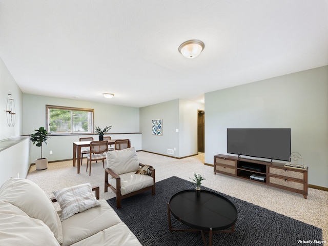 1214 Olivia St SE, New Prague, MN 56071 - living room featuring light colored carpet and baseboards