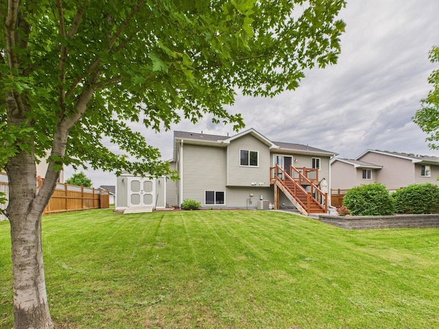 1214 Olivia St SE, New Prague, MN 56071 - rear view of property featuring stairway and a deck