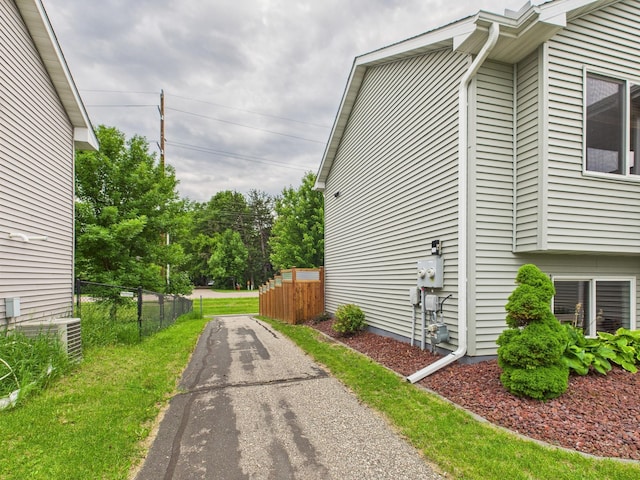 1214 Olivia St SE, New Prague, MN 56071 - view of property exterior featuring cooling unit