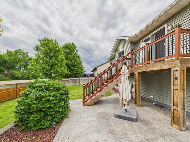 1214 Olivia St SE, New Prague, MN 56071 - view of patio / terrace with a wooden deck and stairs